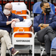 Vice President of basketball operations David Griffin of the New Orleans Pelicans (left) talks with general manager Trajan Langdon prior to the game against the Miami Heat